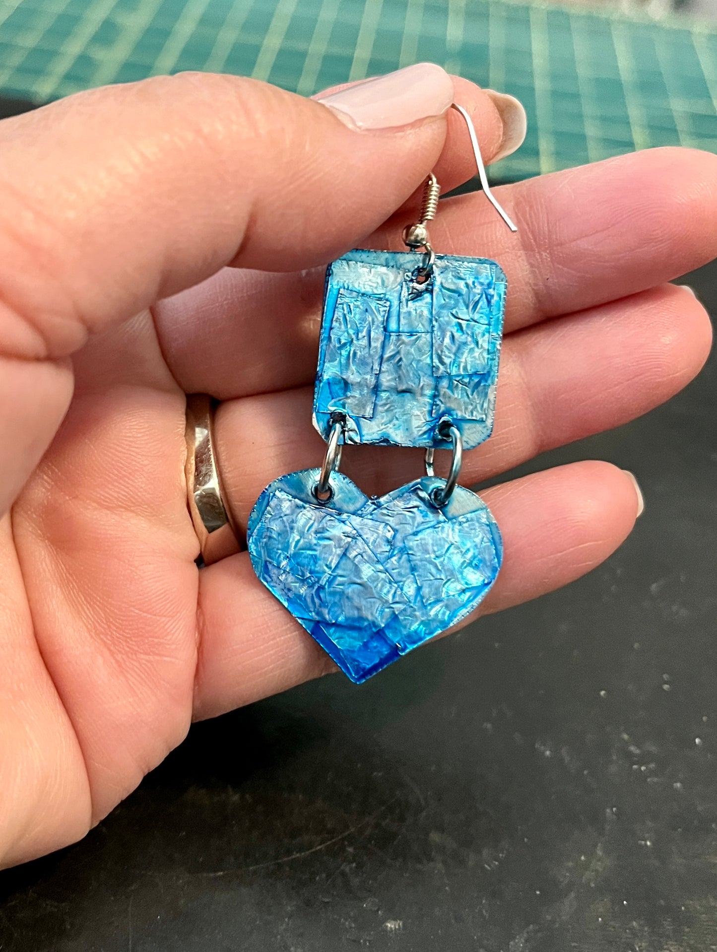 Face and heart earrings